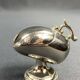 Individual ashtray with metal clasp
