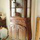 Curved display cabinet in solid walnut, mid-20th century.