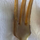 Old corn and silver salad cutlery
