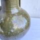 Ancient oil jar in glazed terracotta, khaki green — Auvergne, Lezou