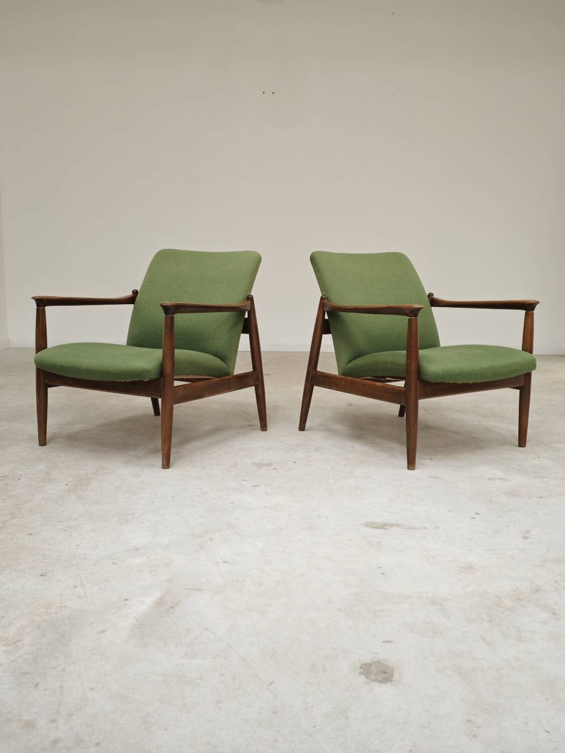 Pair of green GMF 64 armchairs by
Edmund Homa, Poland, 1960s