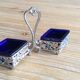Salt shaker /pepper shaker and accessories in silver metal and blue glass compartment