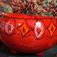 Vintage bright red enamel ceramic tripod vase