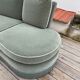 Rounded sofa with fringes