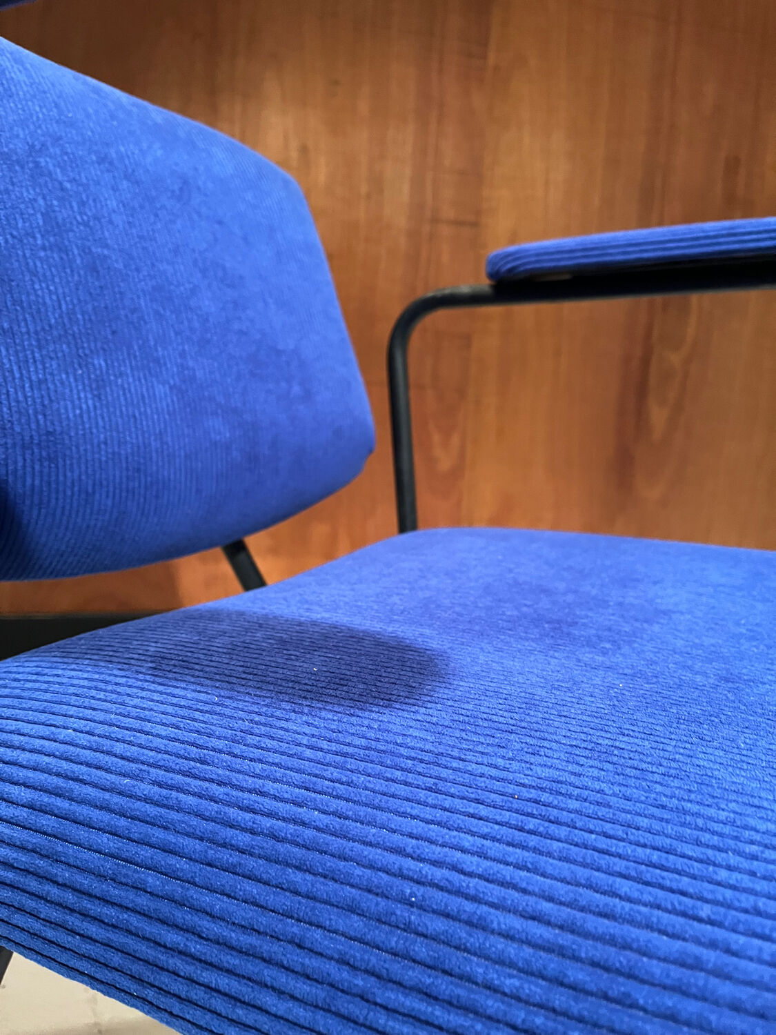 Vintage armchair and its footrest from around 1950.