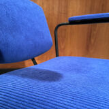 Vintage armchair and its footrest from around 1950.