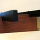 Teak and brass coat and hat rack with 7 sliding hooks, 1960s