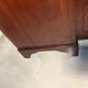 Antique mahogany secretary, upholstered flap and interior storage