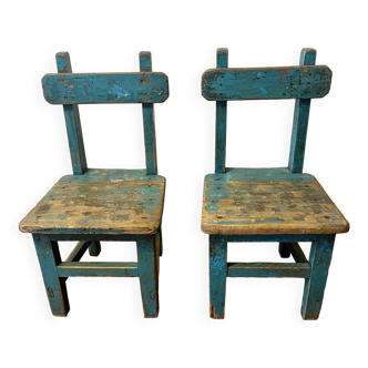 Old pair of small children's school chairs
