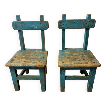 Old pair of small children's school chairs