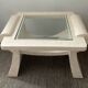 Table basse vintage en travertin et verre biseauté