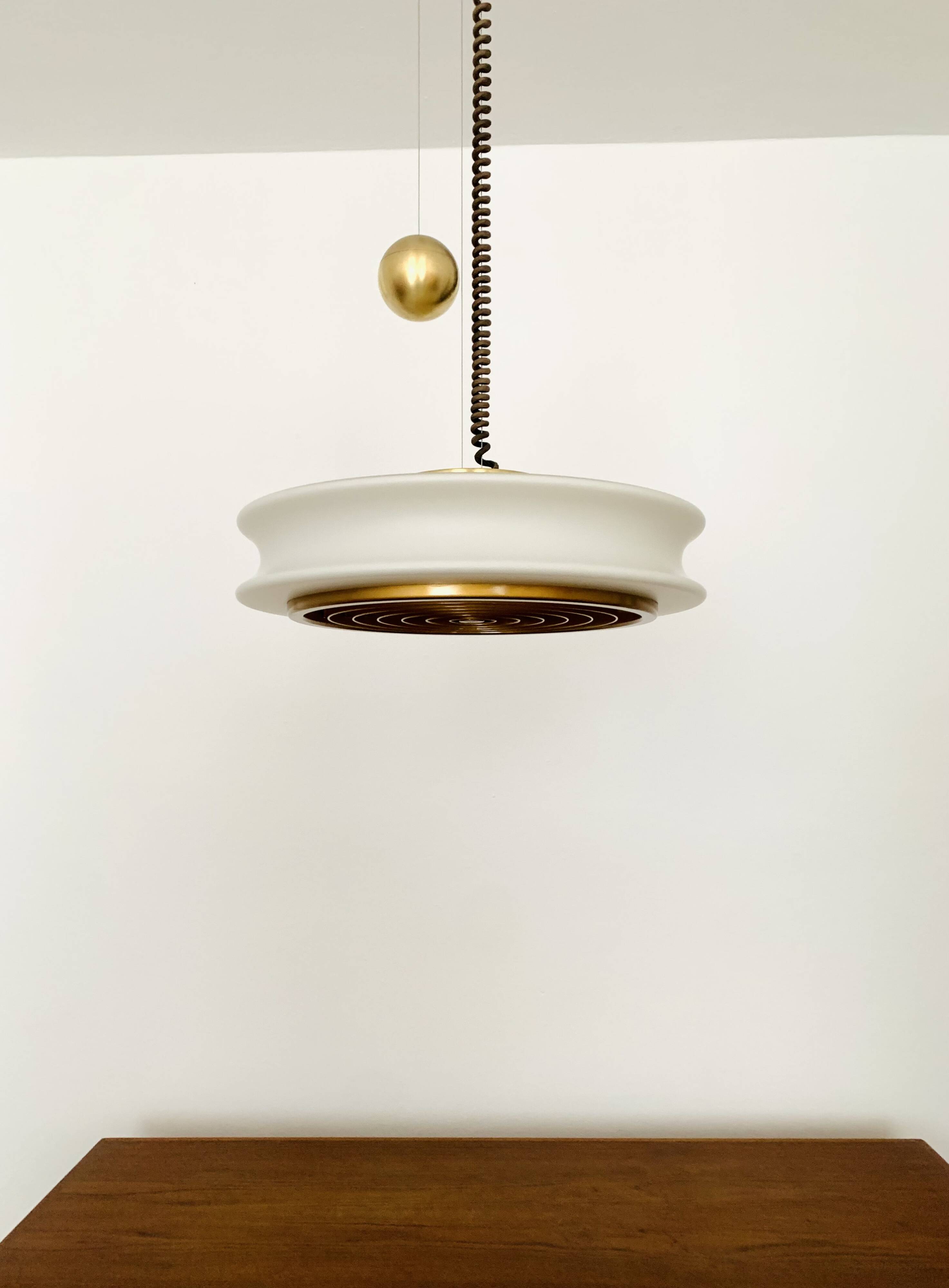 1 of 3 Awesome Adjustable Orion Glass Pendant Lamps from Staff