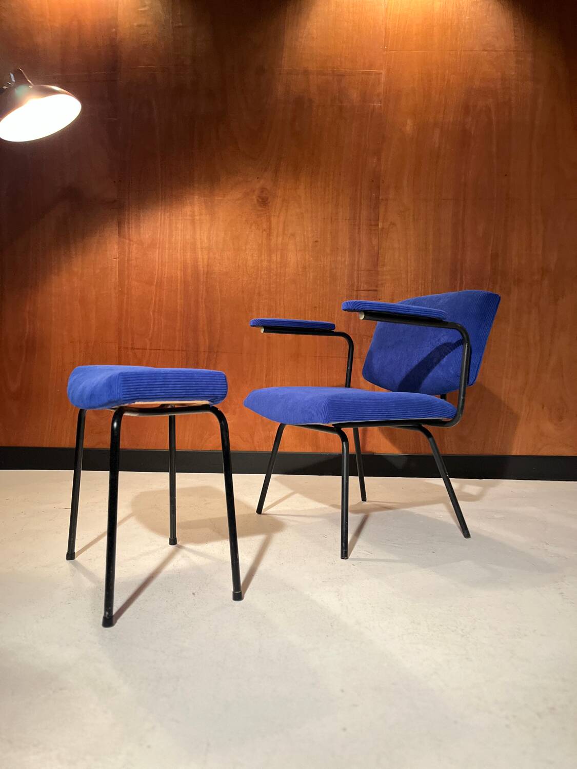 Vintage armchair and its footrest from around 1950.