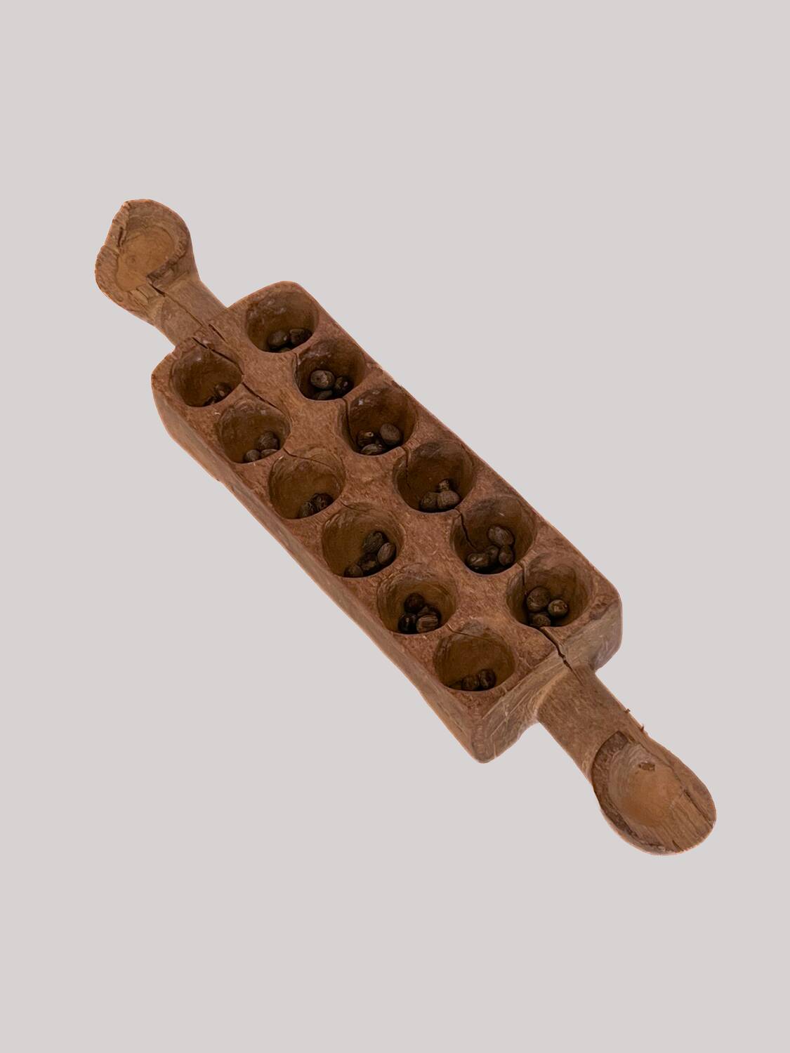 Awale Baoule game (Ivory Coast)