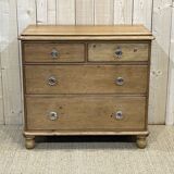 English chest of drawers in nineteenth century fir with its glass buttons
