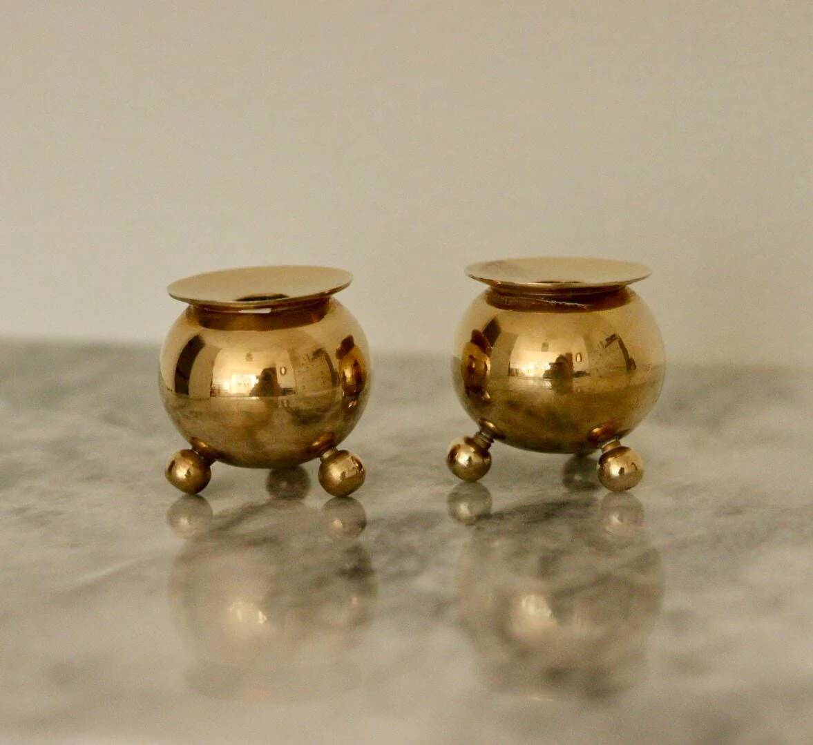 Pair of mid-century Swedish brass candle holders