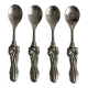 Antique small spoons with a metal bow design