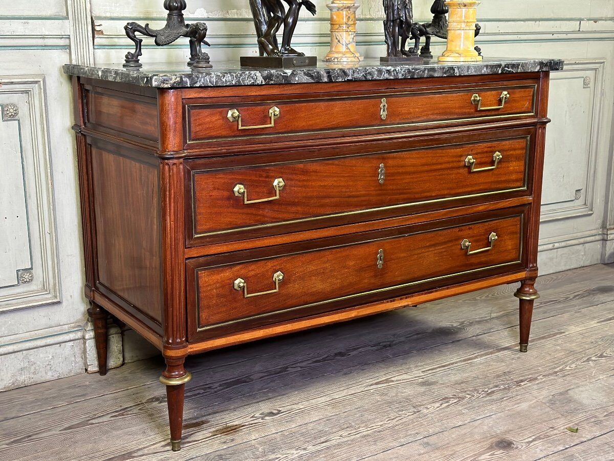 Louis XVI style mahogany commode in three colors, 18th century