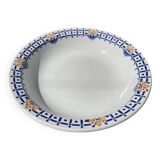 Round, shallow ceramic salad bowl from Saint Amand