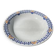 Round, shallow ceramic salad bowl from Saint Amand