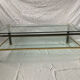 Table basse en verre et laiton