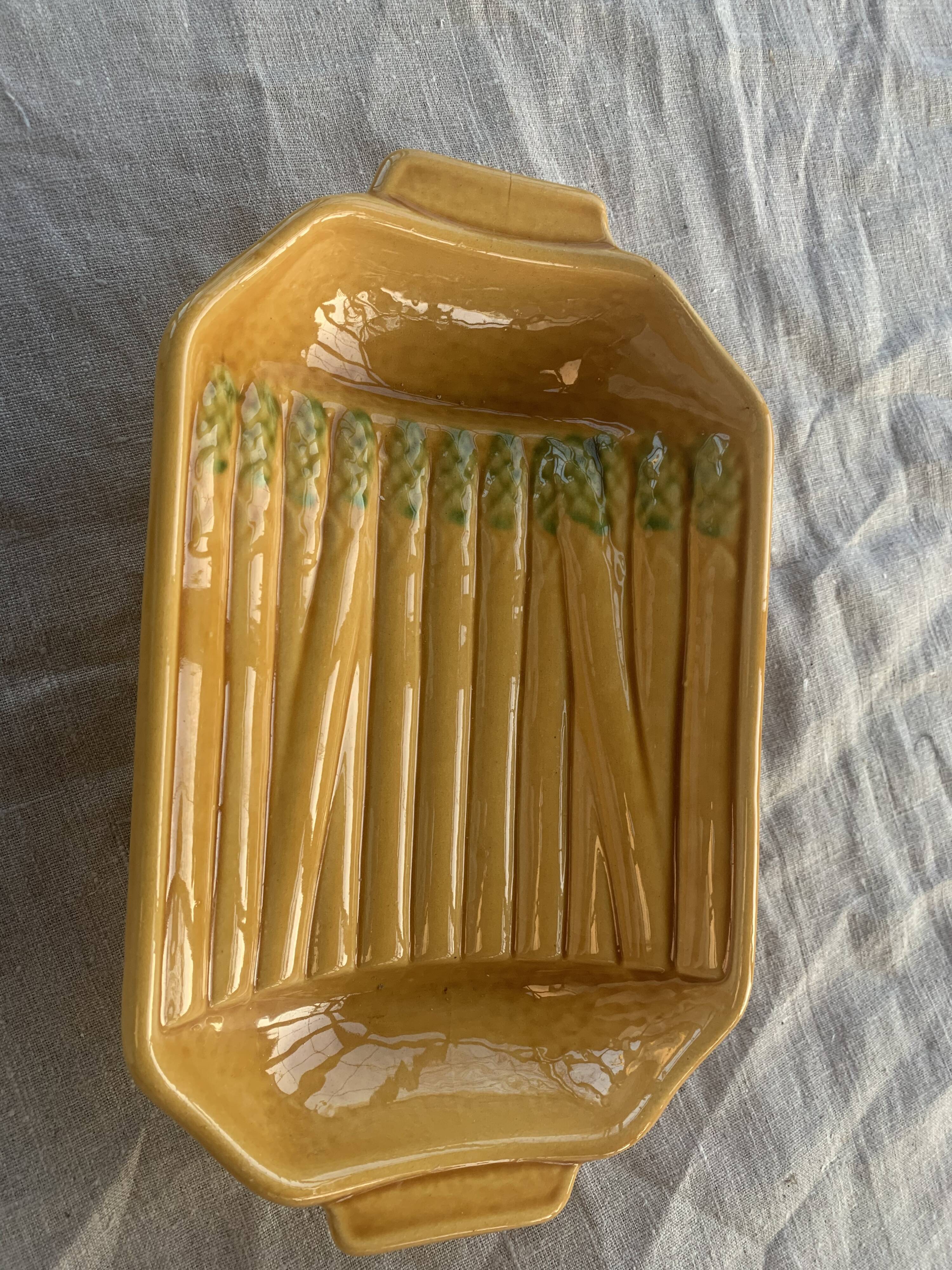 Vintage slip glazed ceramic asparagus dish