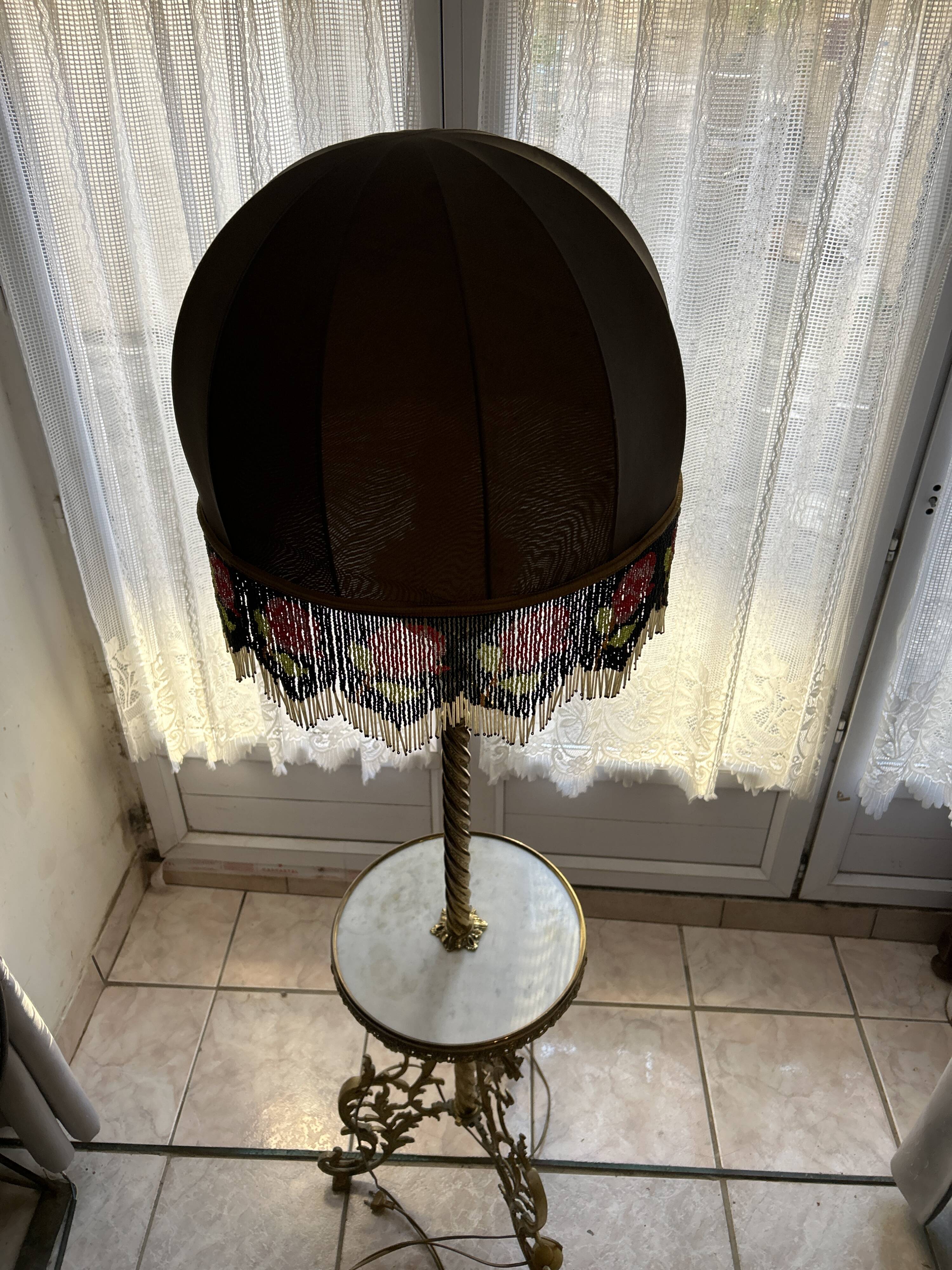 Living room floor lamp in bronze and white marble.
