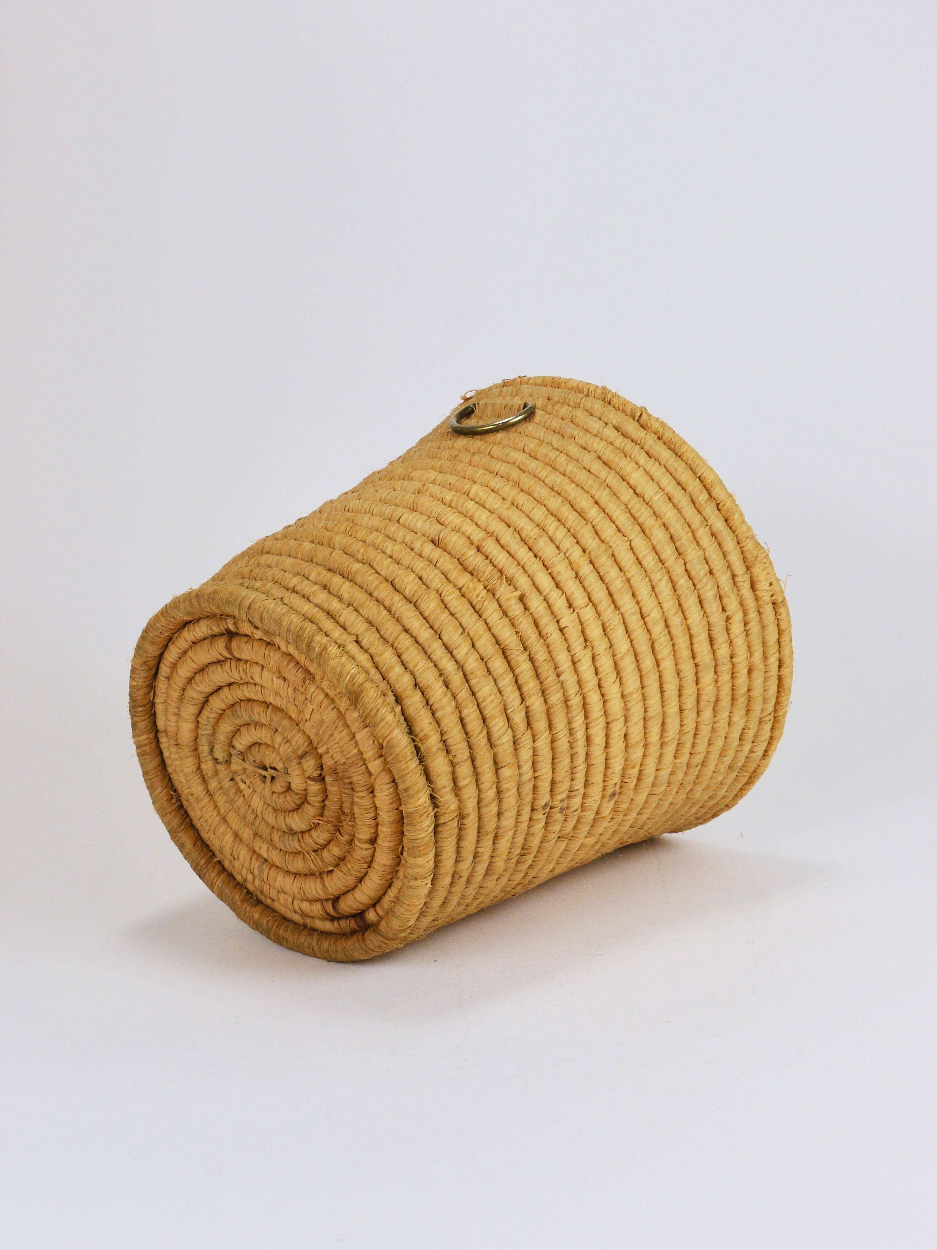 Carl Auböck II paper basket in raffia and brass, umbrella stand, 1950s