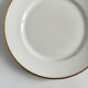 Service d’assiettes à bord doré, monogrammées | E. Bourgeois | Fin XIX