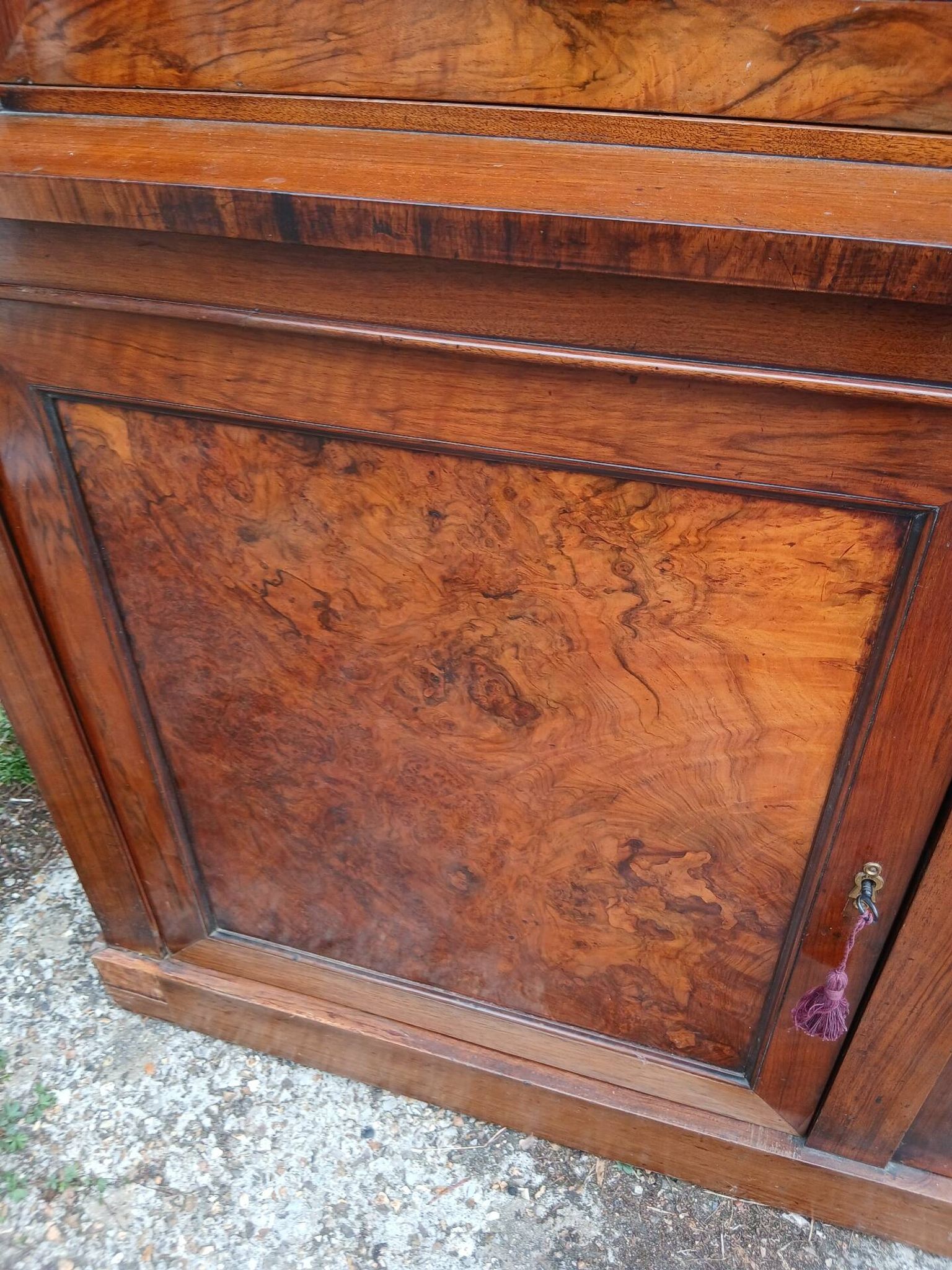 Large walnut shop library from the late 19th century.