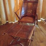 Leather folding armchair and footwork