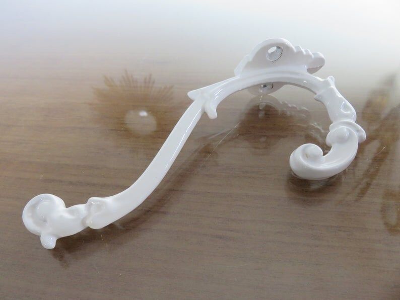 2 white cast iron pads art deco 30s 40s