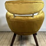Mustard yellow velvet armchair from the 2010s.