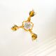 Small vintage brass chandelier with amber crystal pendants.