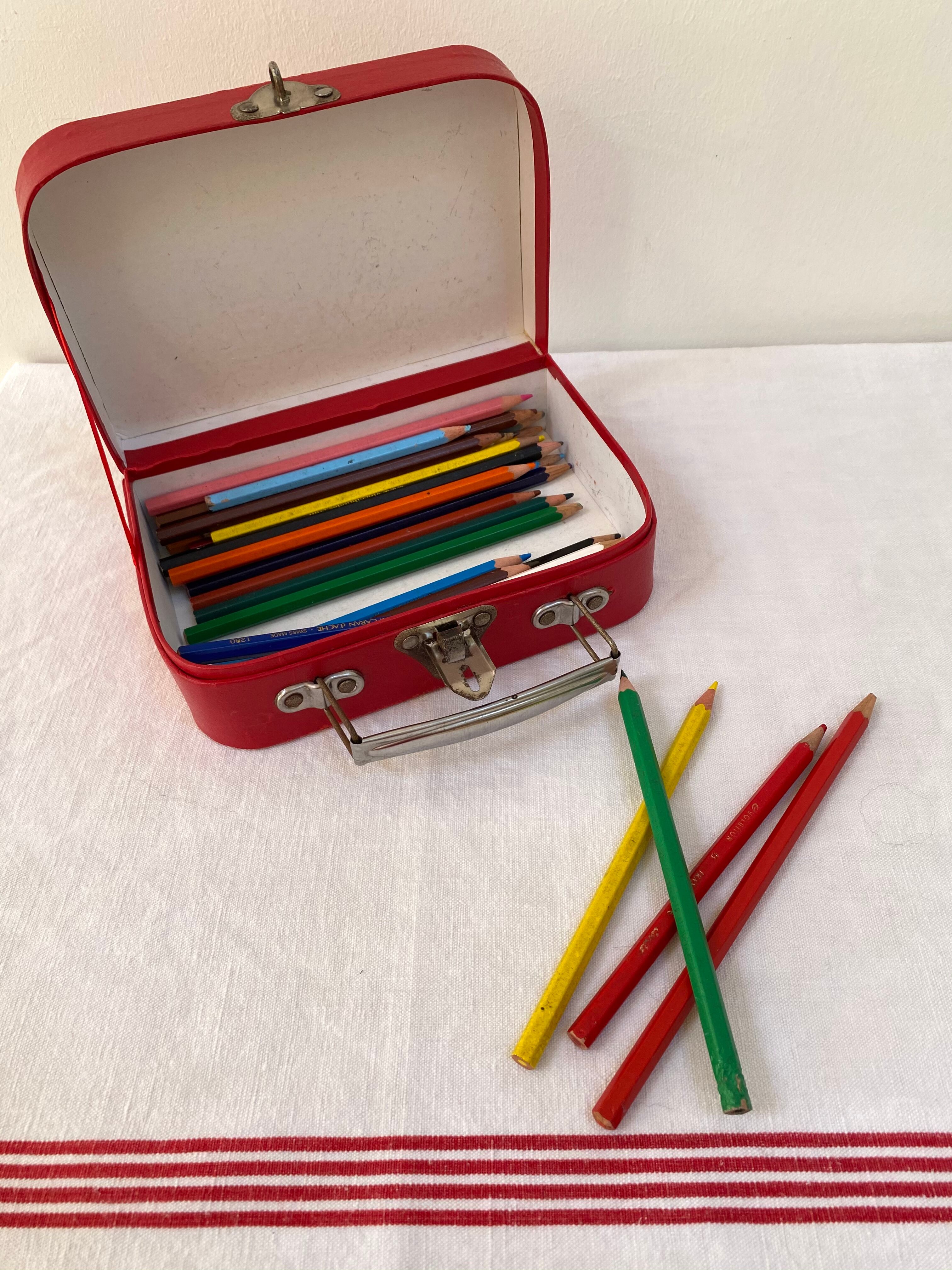 Red suitcase from the 60s