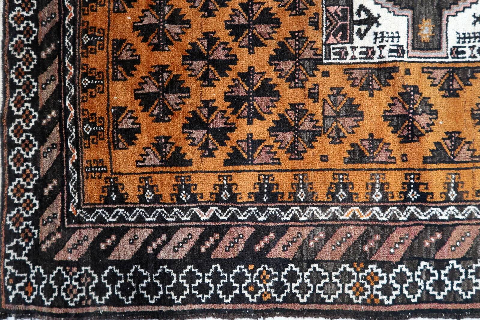 Handmade antique Afghan Baluch rug 107cm x 189cm, 1920s