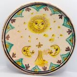 Handmade plate with moon and sun in Romania