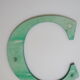 Teaches letter C Green
