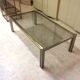 Coffee table with square tubular structure and smoked glass - 1970