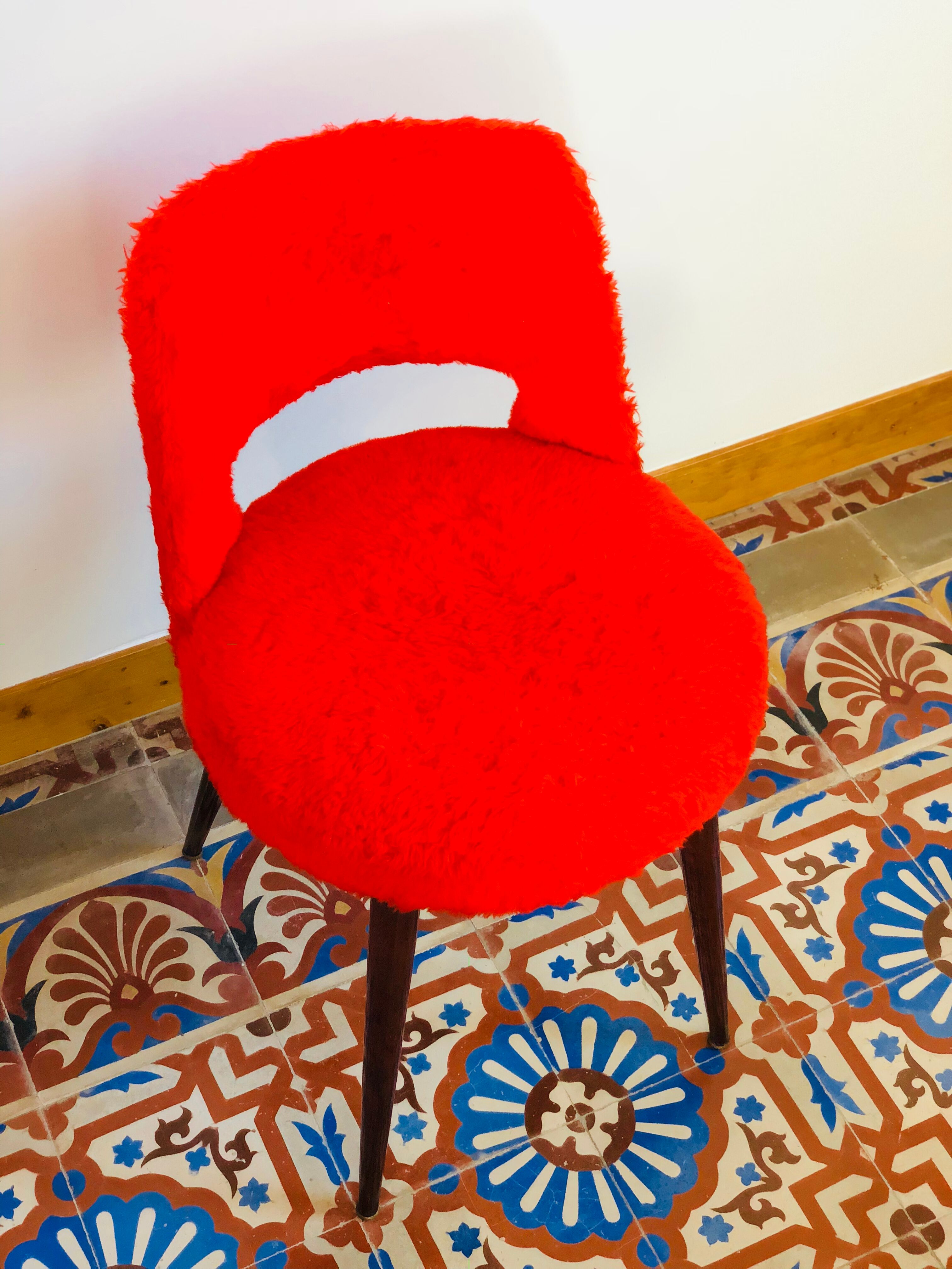 Pair of chairs red rug