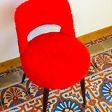Pair of chairs red rug