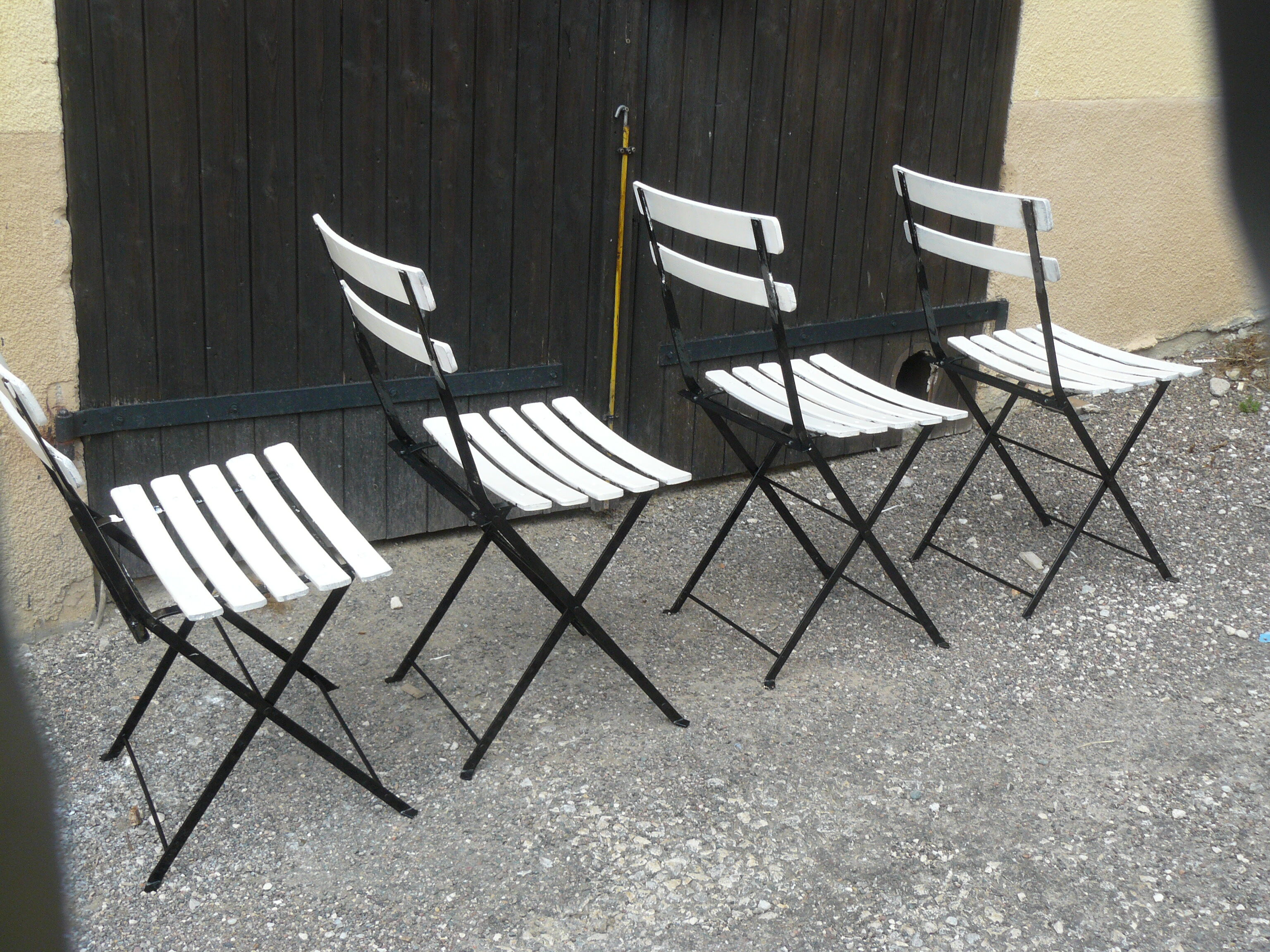 Set of four folding garden chairs