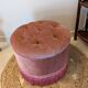 Pouf or footrest in pink velvet with fringes