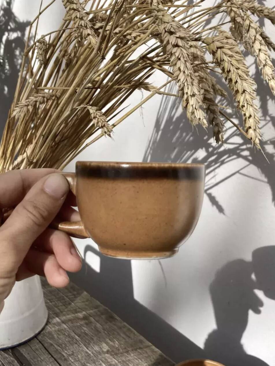 Vintage 1970s stoneware coffee cups and saucers