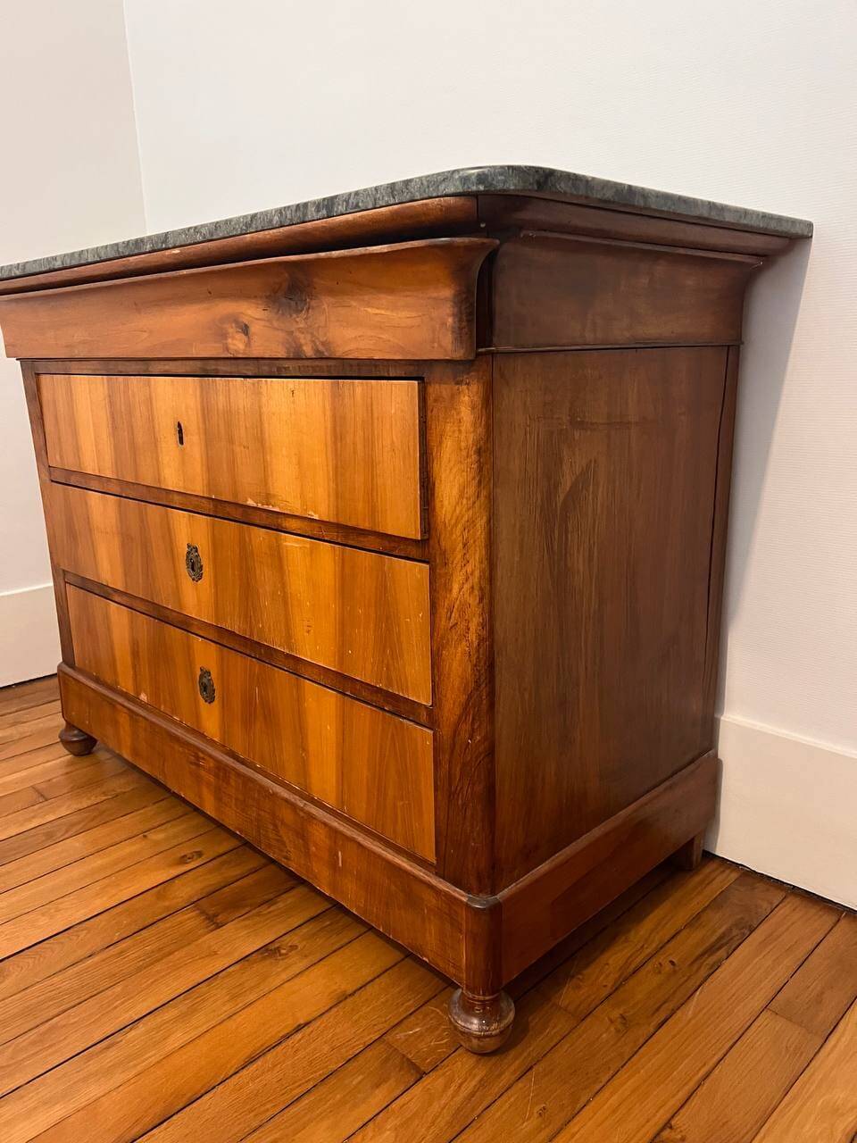 19th-century commode with a marble top