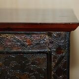 Antique polychrome Tibetan altar cabinet with deer and flowers.