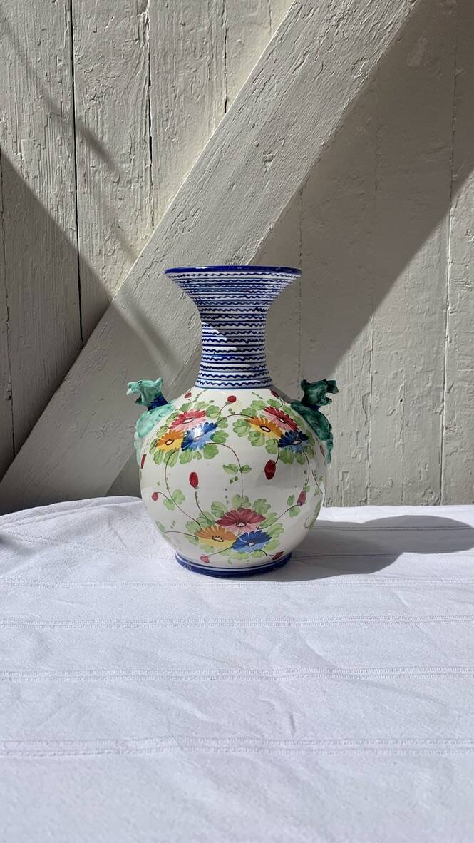 Antique vase, cheetah heads, numbered and stamped