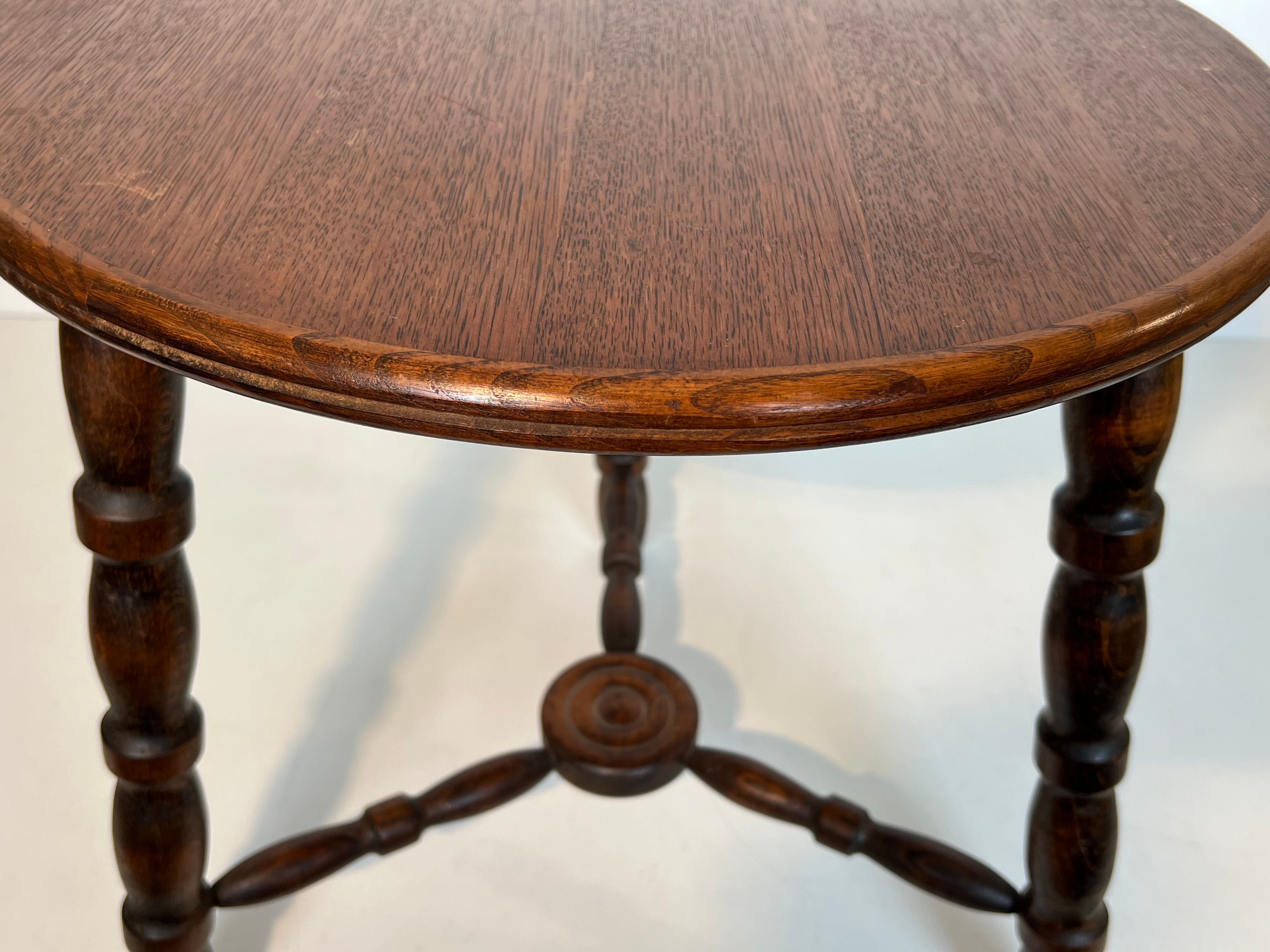 Turned wood coffee table by Charles Dudouyt