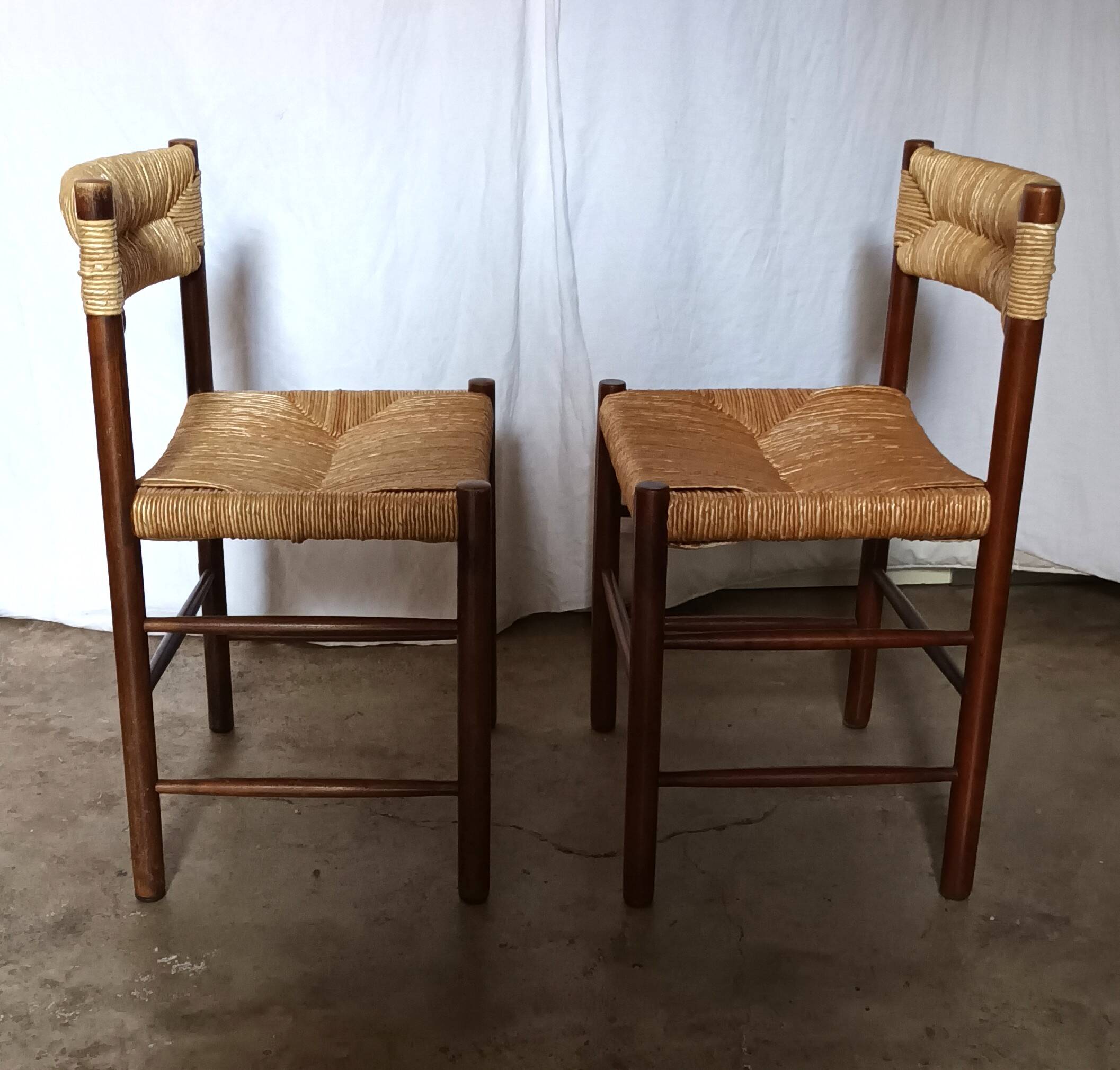 Pair of "Dordogne" chairs by Charlotte Perriand from the 1950s.