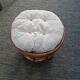 Varnished rattan pouf and cushion